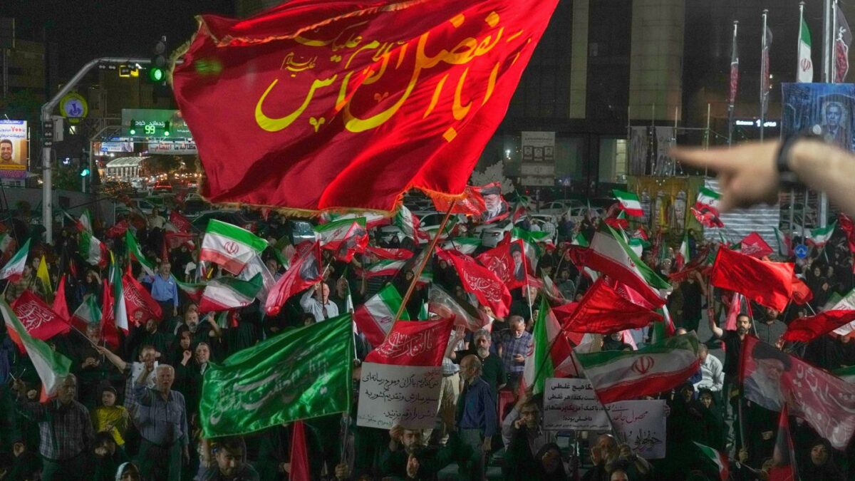 Pro-government demonstrators gather at a square in Tehran, Friday, July 17, 2026.