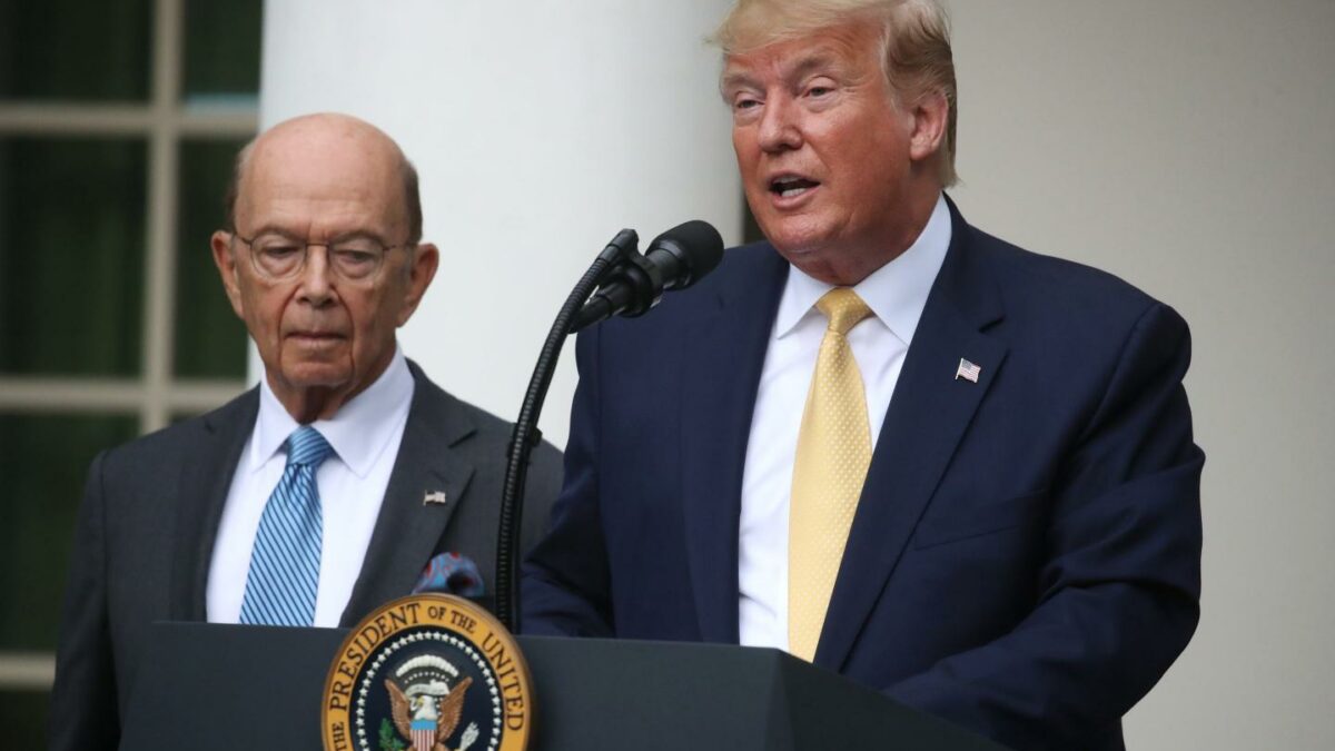 President Donald Trump makes a statement on the census with Secretary of Commerce Wilbur Ross (L) in the Rose Garden of the White House on July 11, 2019 in Washington, DC.