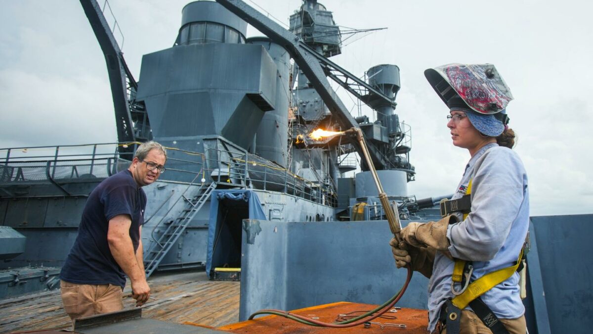 Welder on a navy boat