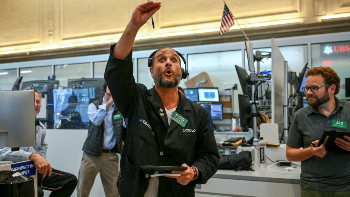 Traders work on the floor of the New York Stock Exchange (NYSE) on July 24, 2026 in New York.