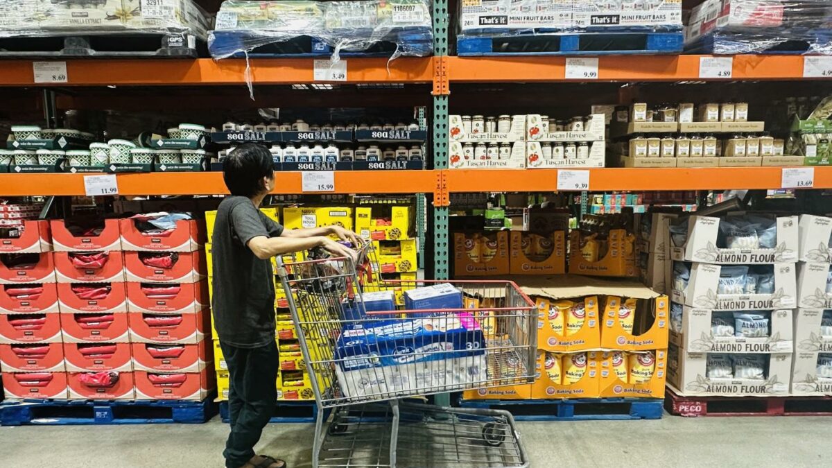 A shopper browses an aisle of food items from a wholesale retailer in Alhambra, California on August 11, 2026